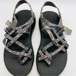 Chaco Women's Strappy Sandals in Black and Orange Pattern